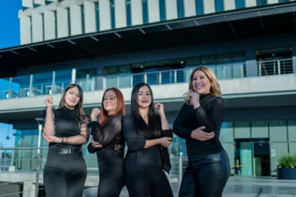 Group of confident women leaders posing outdoors in Juárez, Mexico, showcasing empowerment.